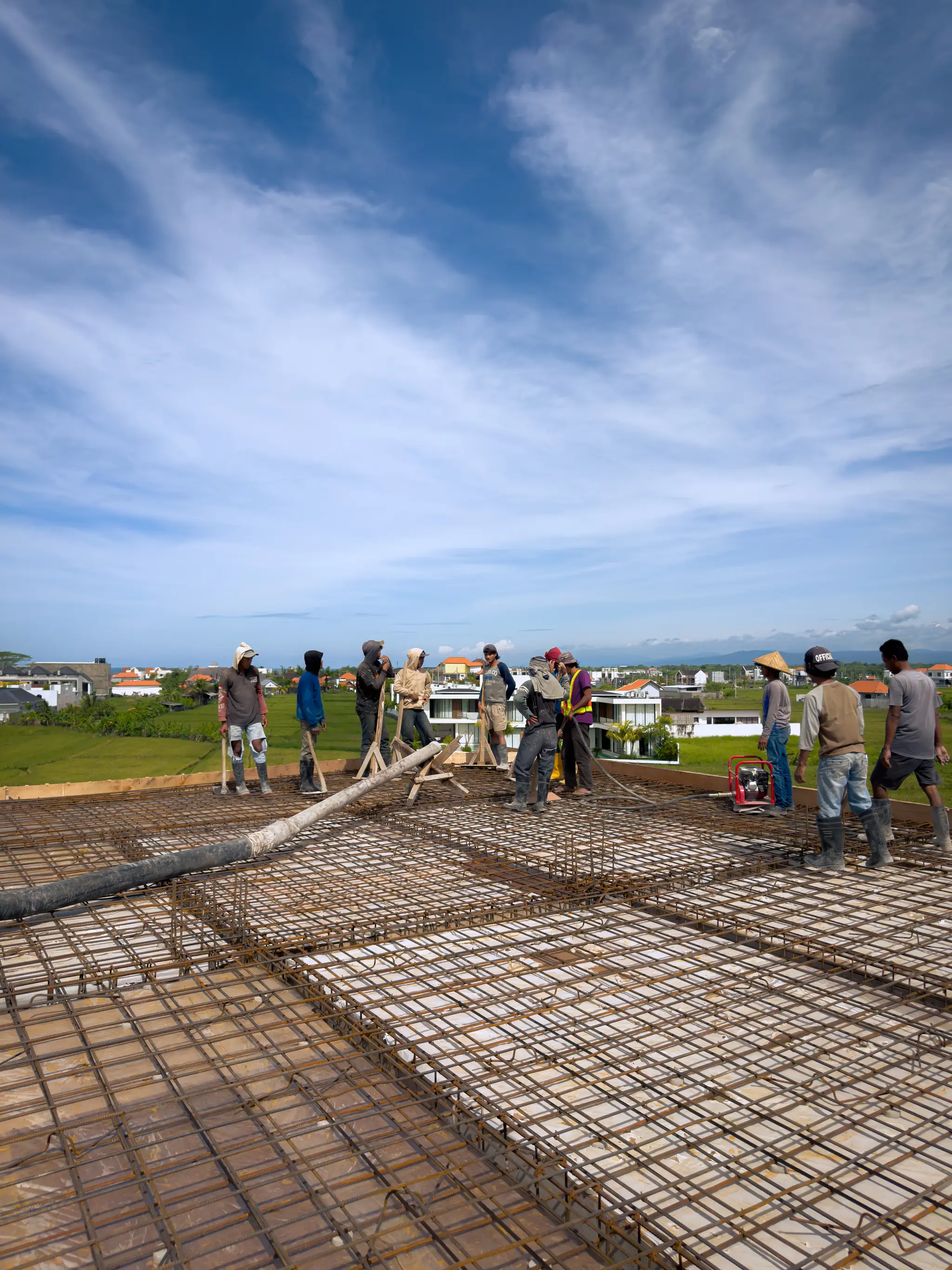 Piece of Paradise — site team laying rooftop reinforcement